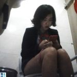 Beautiful Chinese Girls in Toliet do not part with the phone